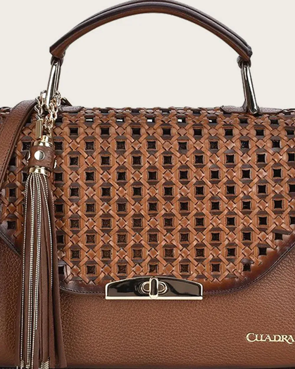 Brown bovine top handle handbag