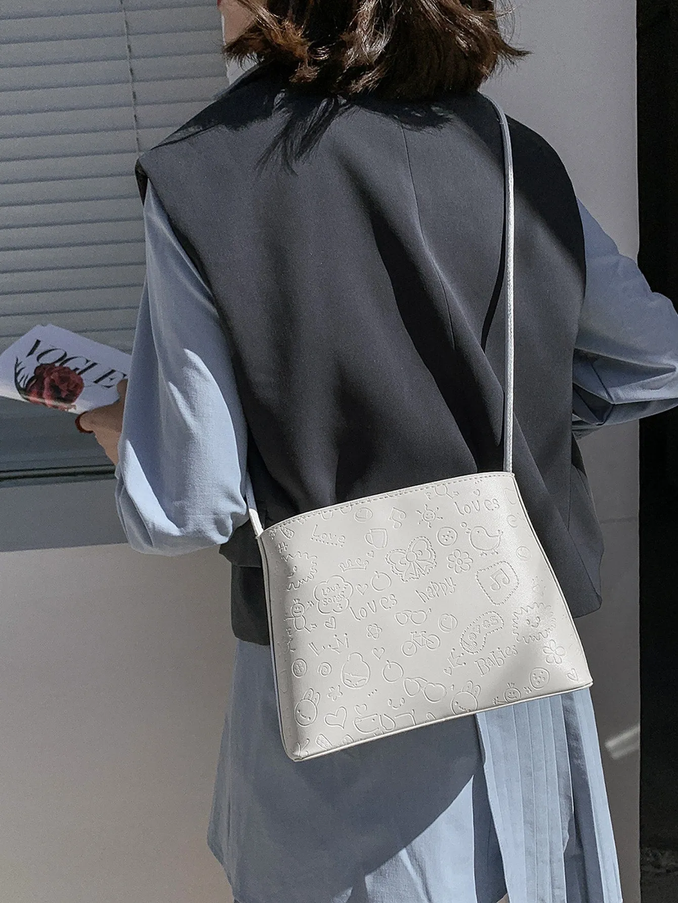 Cartoon Embossed Shoulder Bag